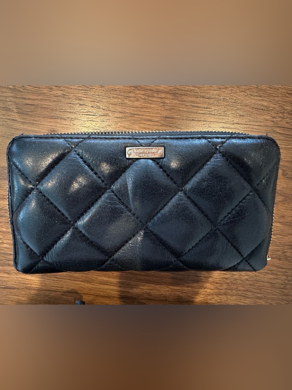 kate spade Black Quilted Leather Zip Clutch with Logo Plate